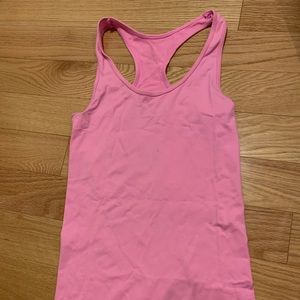Neon pink racer back tank top.